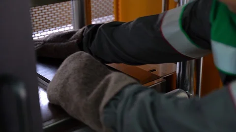 The rubber in the laboratory is placed under the press. Clouse-up. Stock Footage 123435422