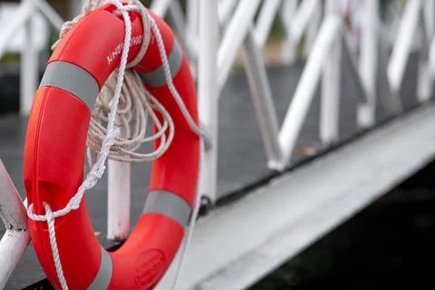 A rubber ring to help people fall by the pool. Stock Photos