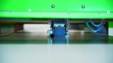 Rubber roller softens laminate foil onto plastic windowsill Stock Footage 304391586