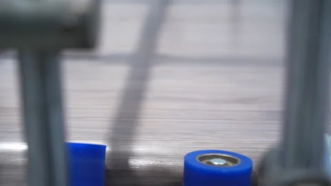 Rubber rollers plain decorative laminate foil onto windowsill Video stock 304395272