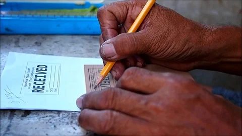 Rubber stamp maker making a pattern Stock Footage 99020011
