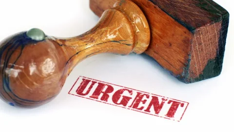 Rubber Stamp Marking Urgent Approval on Official Document Close Up Stock Footage 339975746