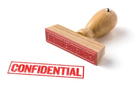 A rubber stamp on a white background - Confidential Stock Photos