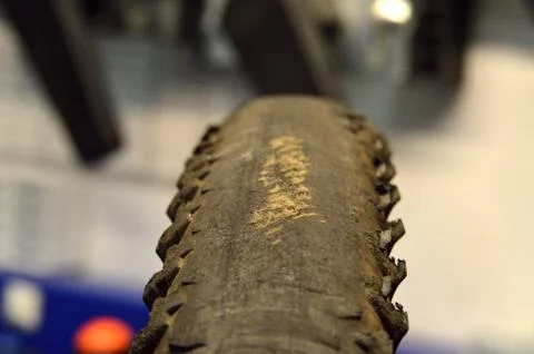 Rubber tire for bicycle with damage Stock Photos