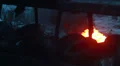 Rubber tires burn in winter cold outdoors, dark smoke rising HD Footage