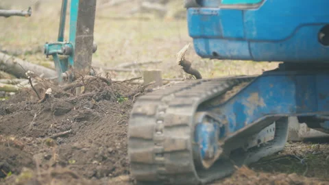 Rubber track at a small excavator Stock Footage 137303407