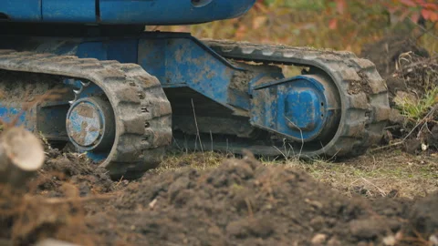 Rubber track at a small excavator Stock Footage 137999215