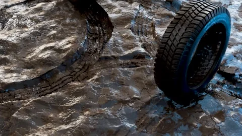 Rubber wheels moving through wet mud, leaving deep tire tracks Stock Footage 314207463