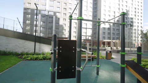 Rubberized surface supports professional workout equipment Видео 330526513