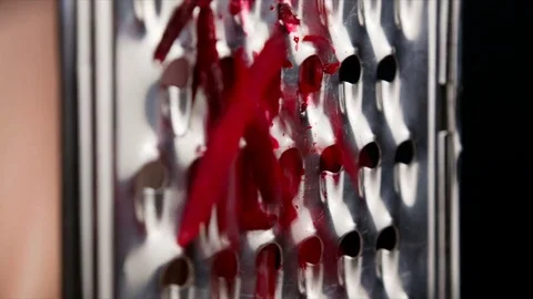 Rubbing the beetroot on metal grater Stock Footage 76818165