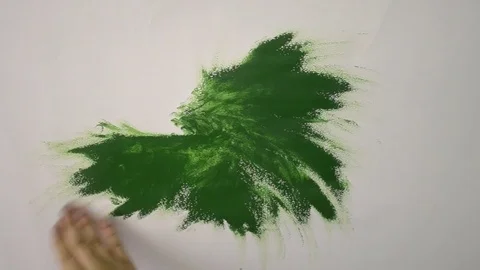 Rubbing the green paint on the white paper Stock Footage 71755152