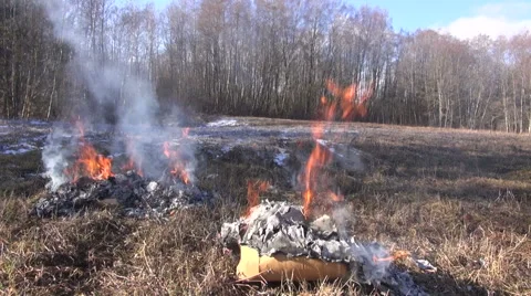 Rubbish burning in spring Stock Footage 62505216