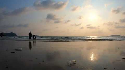 Rubbish plastic bottle left on the beach make pollution in Thailand. Stock Footage 103211330