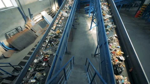 Rubbish recycling plant with two functioning conveyor belts. Stock Footage 93787793