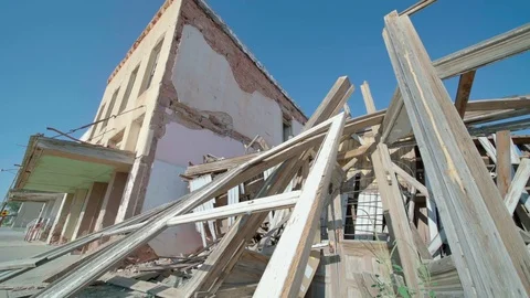 Rubble and Abandoned Building Move Left Low Angle Stock Footage 80833920