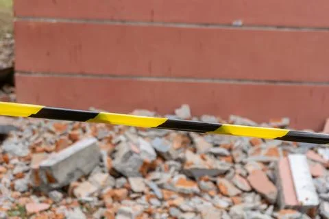 Rubble consisting of red bricks, concrete pieces, and debris Stock Photos