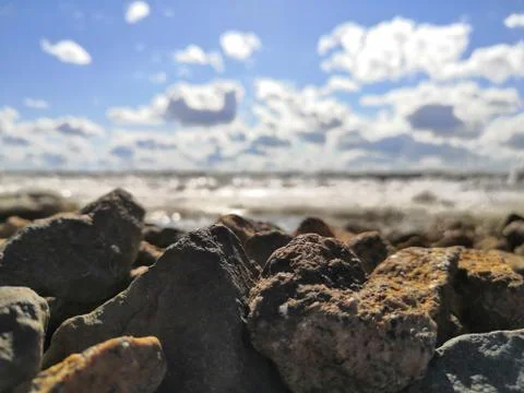 Rubble on the shore Stock Photos
