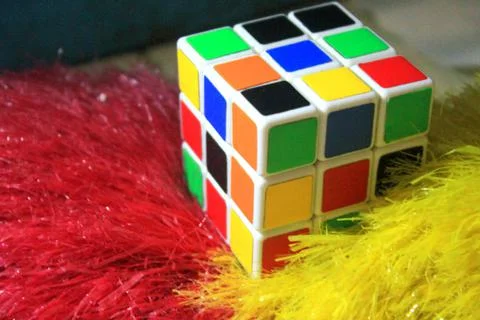 A rubik on a feather Stock Photos