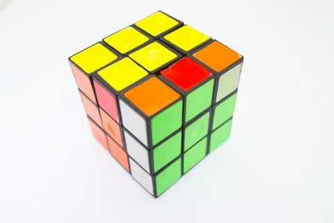 Rubik magic cube over the isolated white background Stock Photos
