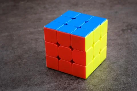 A Rubik's cube, a mathematical problem, isolated on black background Stock Photos