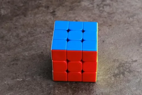 A Rubik's cube, a mathematical problem, isolated on black background Stock Photos