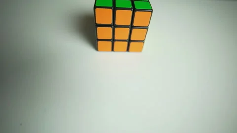 Rubik's cube on a table in office Stock Footage 158675649