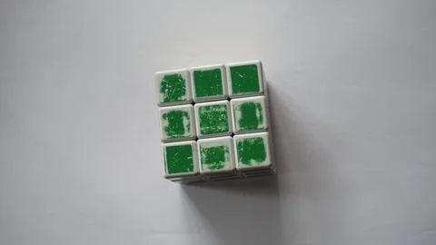 Rubik's cube on a white surface Stock Photos