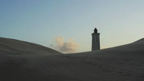 Rubjerg knude lighthouse surrounded by sand dunes Stock Footage 338091885