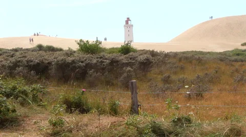Rubjerg lighthouse surrounded by sand Stock Footage 40637788
