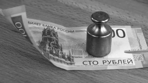 Ruble under pressure black and white Stock Footage 323843860