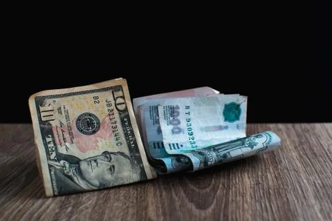 Rubles and dollars on the table Stock Photos