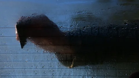 Rubs the rear window of the car Stock-Footage 107875401