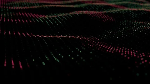 Ruby and emerald color animation background of particles on surface with waves Stock Footage 99345012