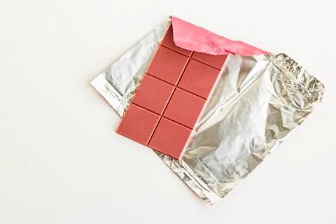 Ruby Chocolate on the aluminum own packaging at white Stock Photos