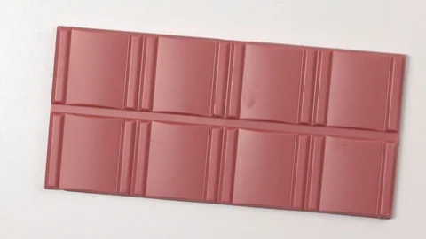 Ruby Chocolate Bar made from ruby cocoa bean. New dimension of chocolate sweets. Video stock 124621677