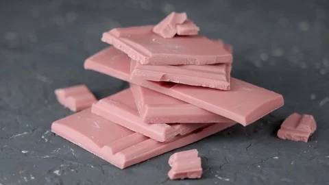 Ruby Chocolate Bar made from ruby cocoa bean. New dimension of chocolate sweets. Video stock 124888870