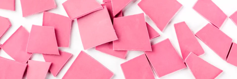 Ruby chocolate, overhead panorama on a white background Stock Photos