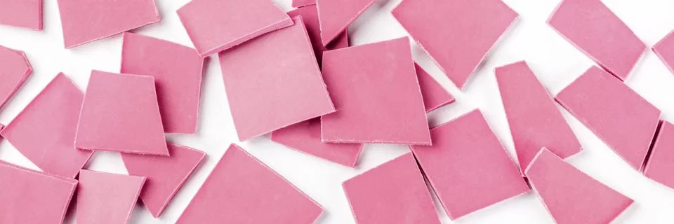 Ruby chocolate, overhead panorama on a white background Stock Photos