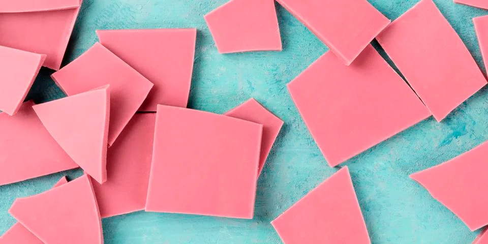 Ruby chocolate, overhead panoramic shot on a blue background 스톡 사진