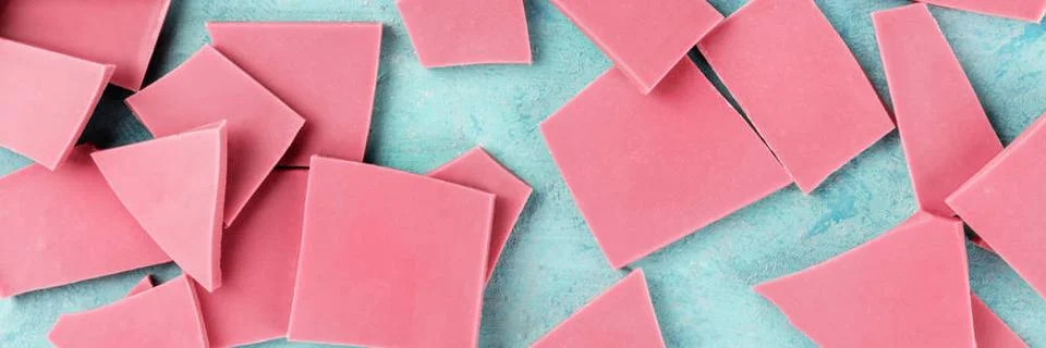 Ruby chocolate panorama, shot from the top on a blue background Ruby choco... Stock Photos