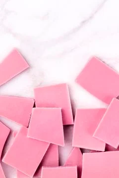 Ruby chocolate, shot from the top on a white marble background with a place for 스톡 사진