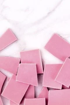 Ruby chocolate, shot from the top on a white marble background with a place for Foto stock
