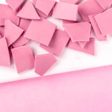 Ruby chocolate, square overhead shot on a pink background with a place for text 스톡 사진