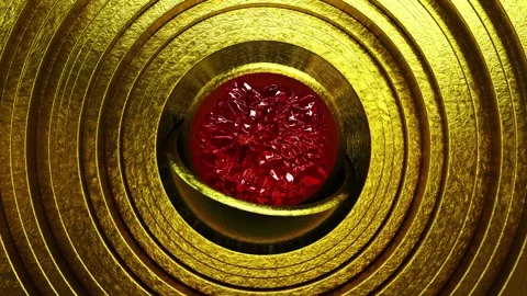 Ruby gemstone inside of golden hemispheres surrounded by moving rings in UHD Video stock 266537405