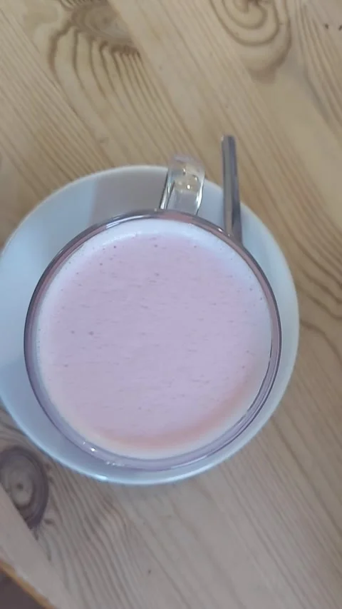 Ruby Hot Chocolate Descent &amp; Swirl: Indulgent Treat in Dundee Cafe Video stock 305939236