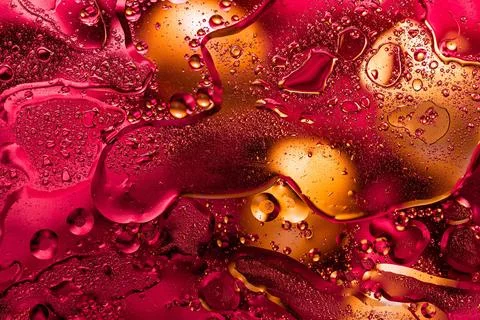 Ruby red boiling liquid abstract background photo Fotos de archivo