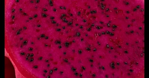 Ruby red exotic cactus dragon fruit whole cut half on white background Stock Footage 270142563