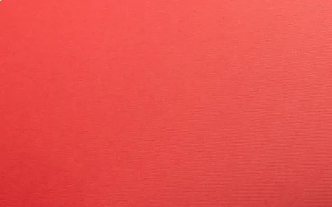 Ruby red paper background with a matte texture and soft tones. Bold crimson a Stock Photos