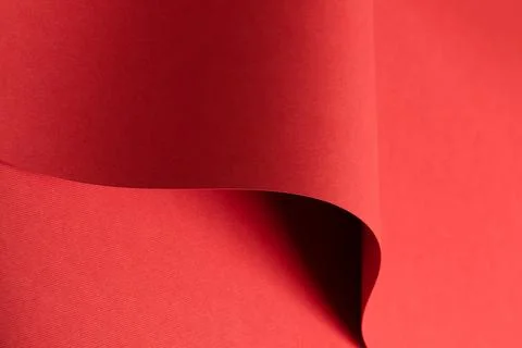 Ruby red paper background with a matte texture and soft tones. Bold crimson a 库存照片