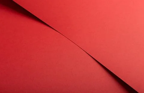 Ruby red paper background with a matte texture and soft tones. Bold crimson.. Stock Photos